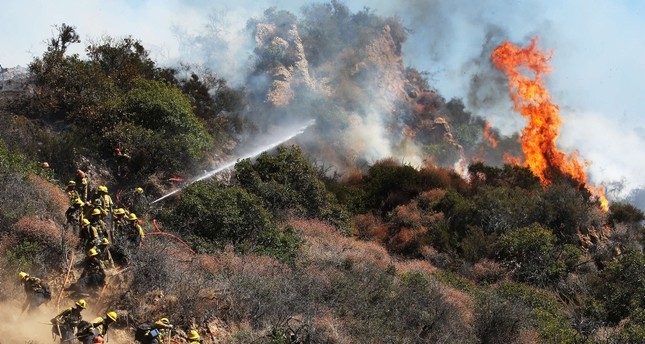 Wildfires threaten California, prompting evacuations of 200 homes