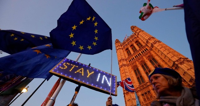 UK PM Johnson says will pause Brexit legislation until EU decides on…