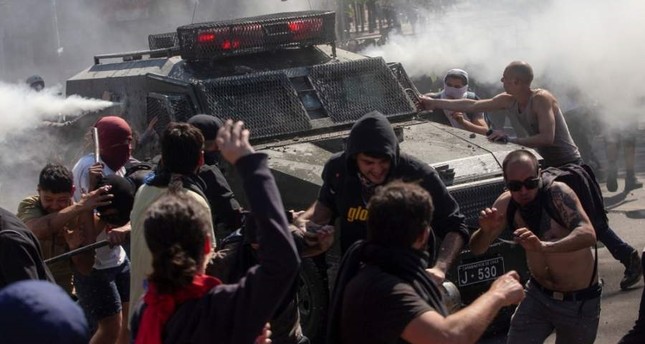 Death toll grows in Chile protests over metro price hikes