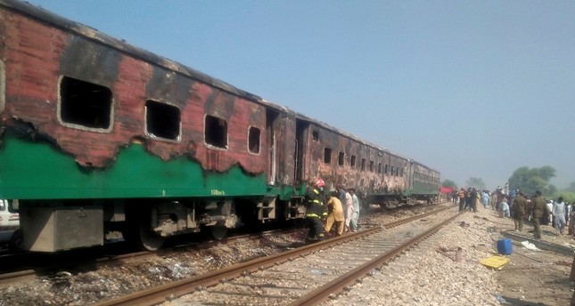 At least 62 killed in Pakistan train fire after cooking accident