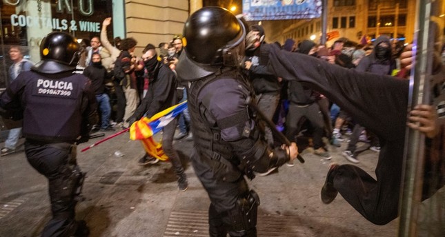 Spanish police clash with protesters in downtown Barcelona