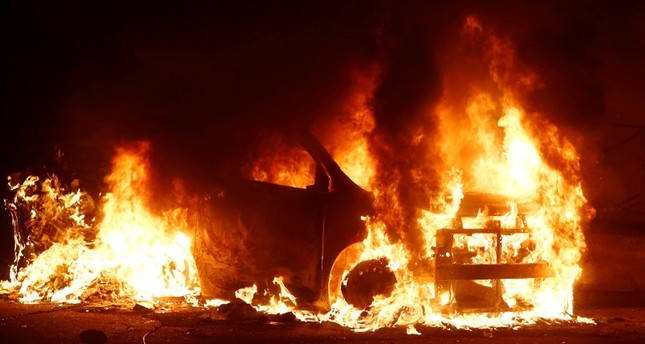 Cars torched during riot at Malta migrant center