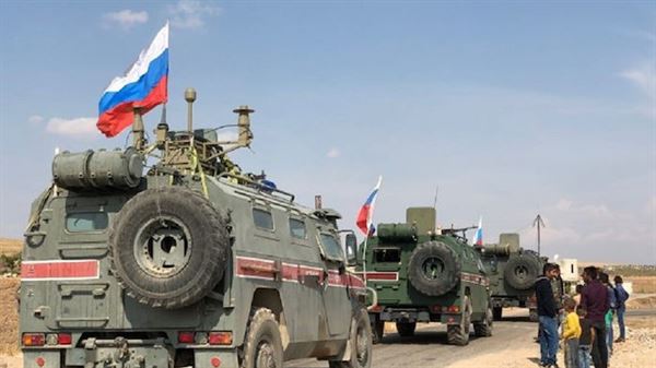Russian military police get armored vehicles in Syria