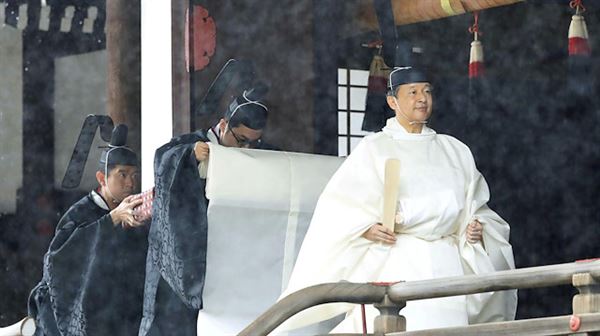 Japan’s monarch enthroned in ancient-style ceremony