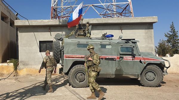 Russian military police patrol Turkish-Syrian border