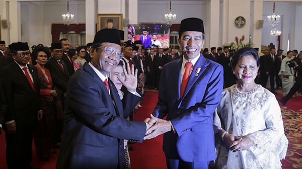 Indonesia’s leader unveils cabinet including archrival