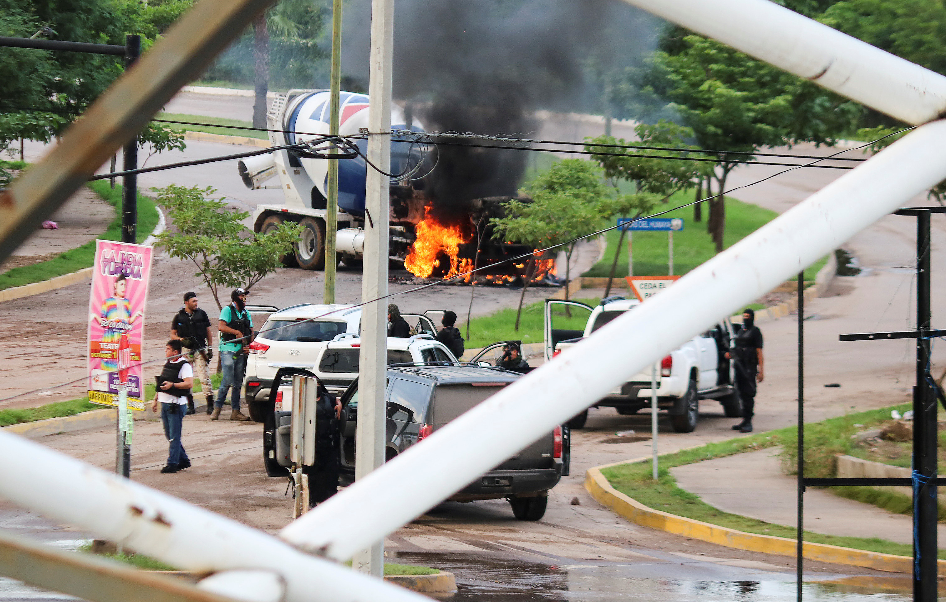 Cartel gunmen terrorize Mexican city, free El Chapo's son