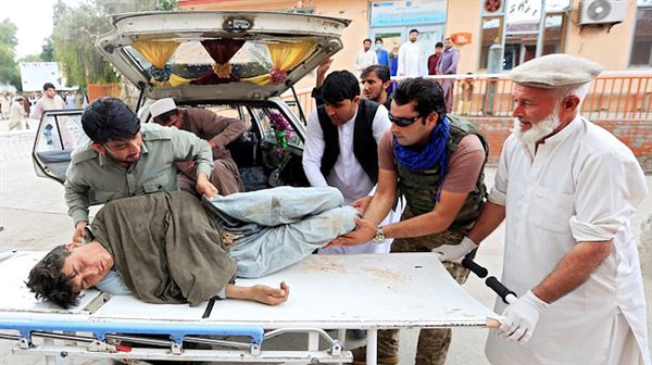 Afghans search for bodies after at least 69 killed in mosque…