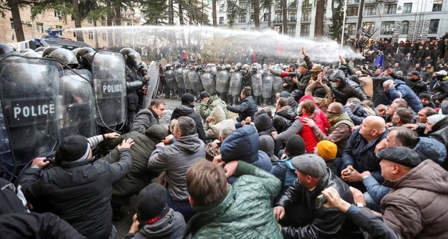 Police in Georgia disperse, detain protesters demanding early election