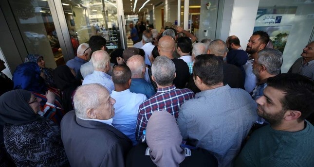 Lebanon's banks reopen after 2-week hiatus over protests