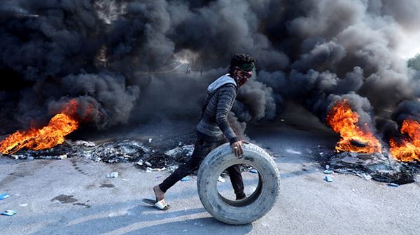 Protesters burn tyres in southern Iraq in renewed anti-government rage