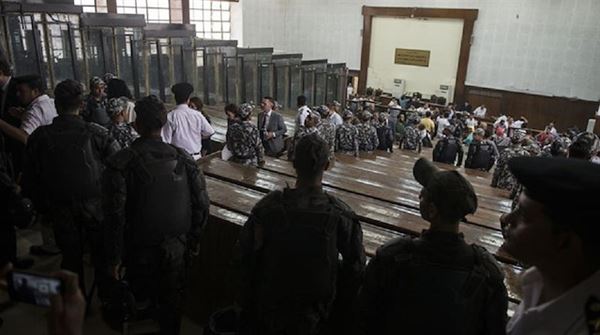 Egypt court sentences seven to death for police attack