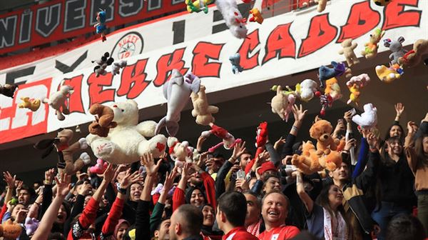 Turkish football fans rain toys to children