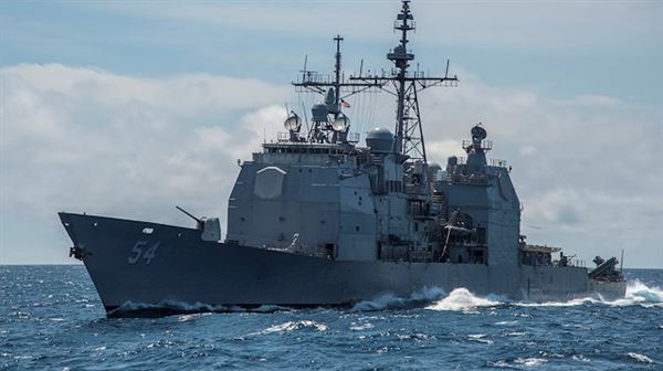 US warships sail in disputed South China Sea, angering China