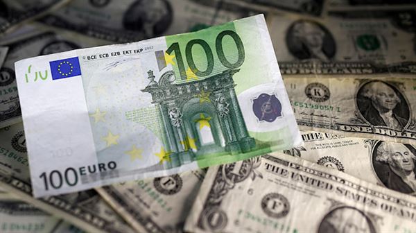 Euro hits lowest in three weeks as dollar gains from trade optimism