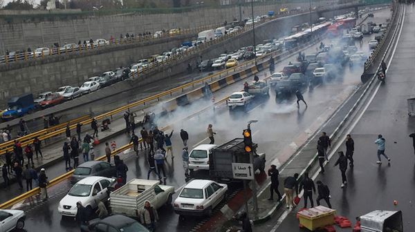 Iranian policeman killed in clashes amid fuel protests
