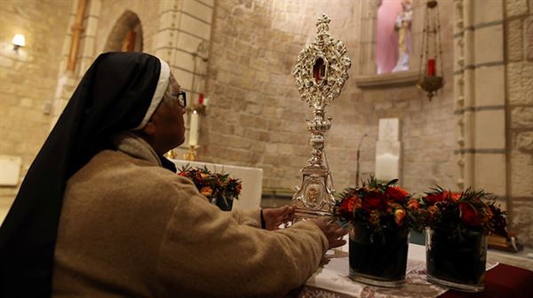 Wooden relic of Jesus manger on pre-Christmas display in Jerusalem