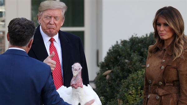 Trump jokes on impeachment, Turkey as he pardons birds