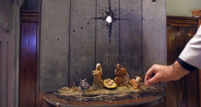 “جرح بيت لحم”.. لوحة للفنان البريطاني”بانسكي” بمناسبة أعياد الميلاد