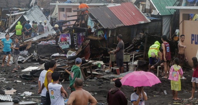 1 killed, thousands evacuated as typhoon hits Philippines