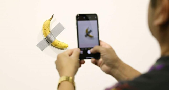 Police guard new $120,000 duct-taped banana after 'hungry artist' eats it