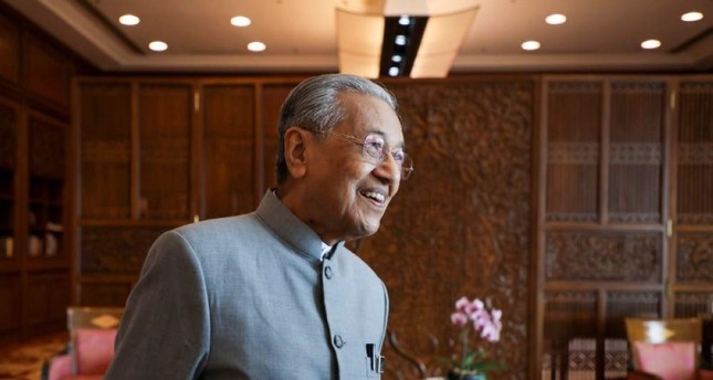 Malaysia's Mahathir says will step down for Anwar but not before November