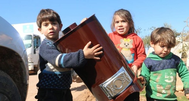 Turkish aid group provides heating stoves to Syrian refugees